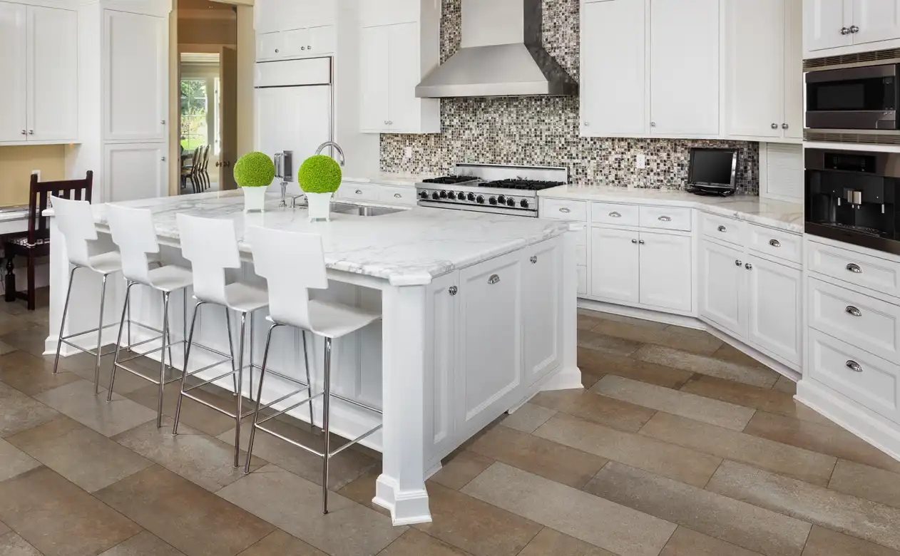 Tile Flooring in white kitchen with mosaic tile backsplash